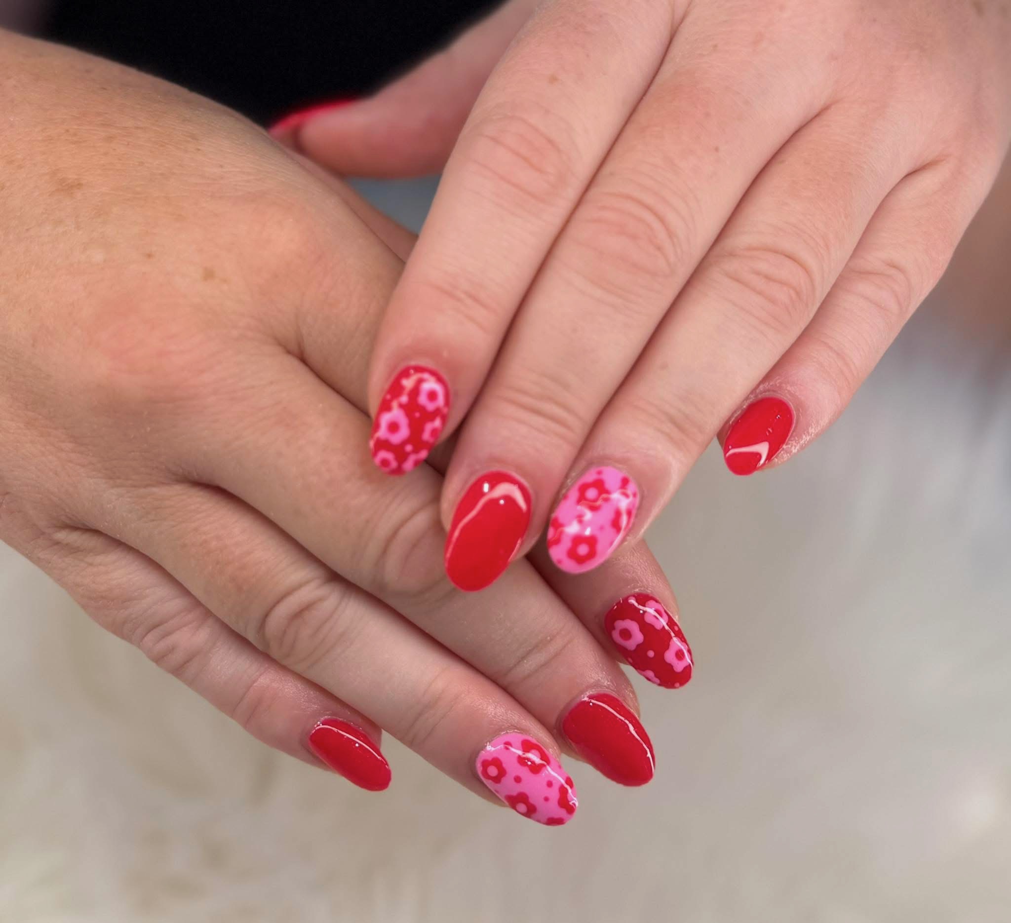 Red and pink floral nail art